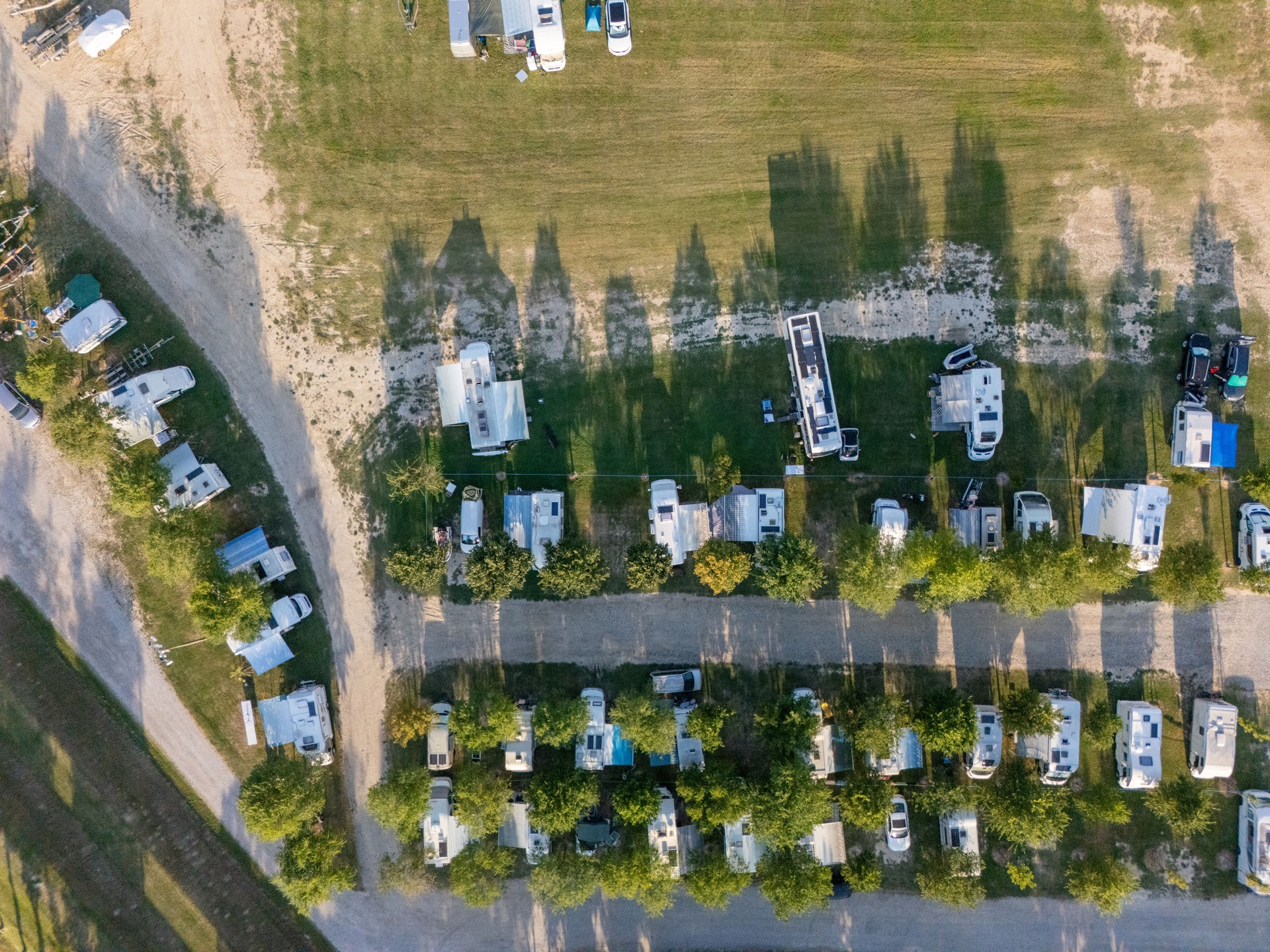 Aerial View of RVs Parked in Open Field